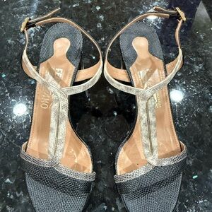 Genuine. Slightly worn Feragamo classy designed heals